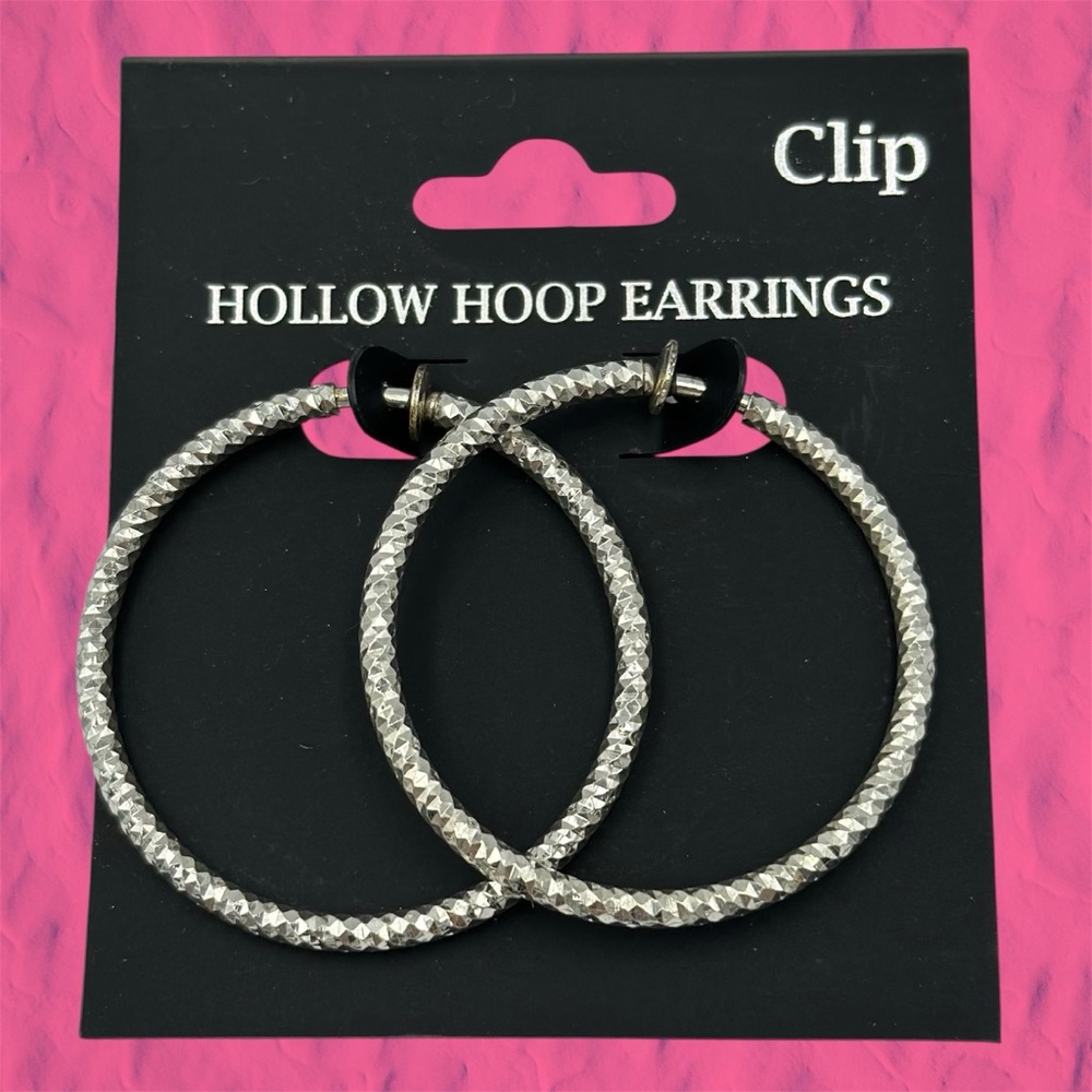 Spring Back Silver Tone Diamond Cut Clip On Hoop Earrings